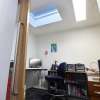 Large open office with skylight