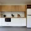 Transportable modular unit with kitchenette