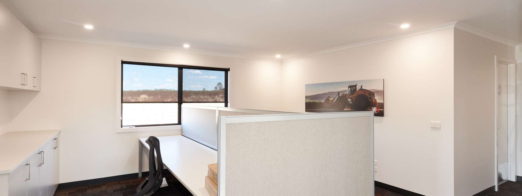 Open plan modular office with carpet tiles